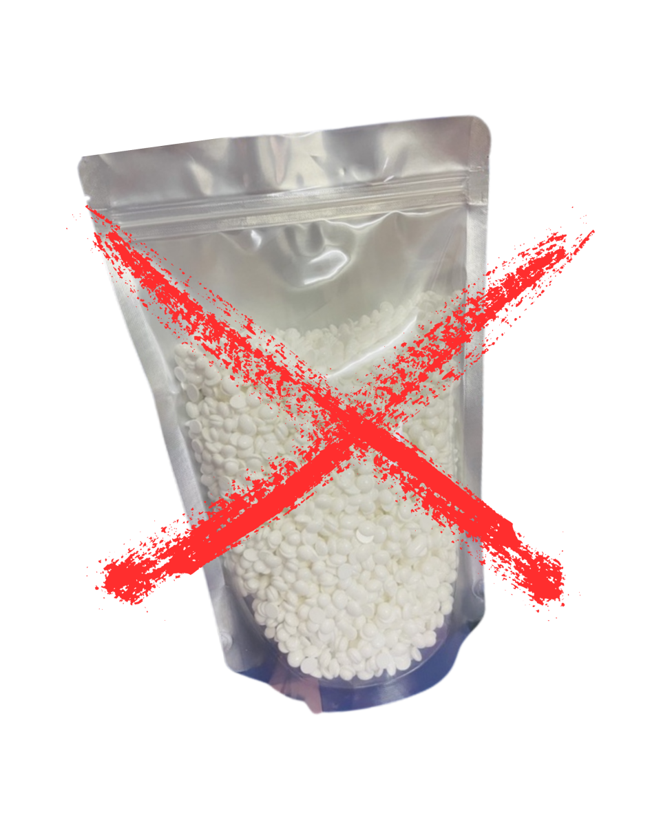 Sản phẩm sáp wax lông dạng hạt màu trắng không rõ nguồn gốc